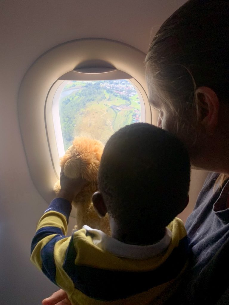 Caleb looking out the ariplane window